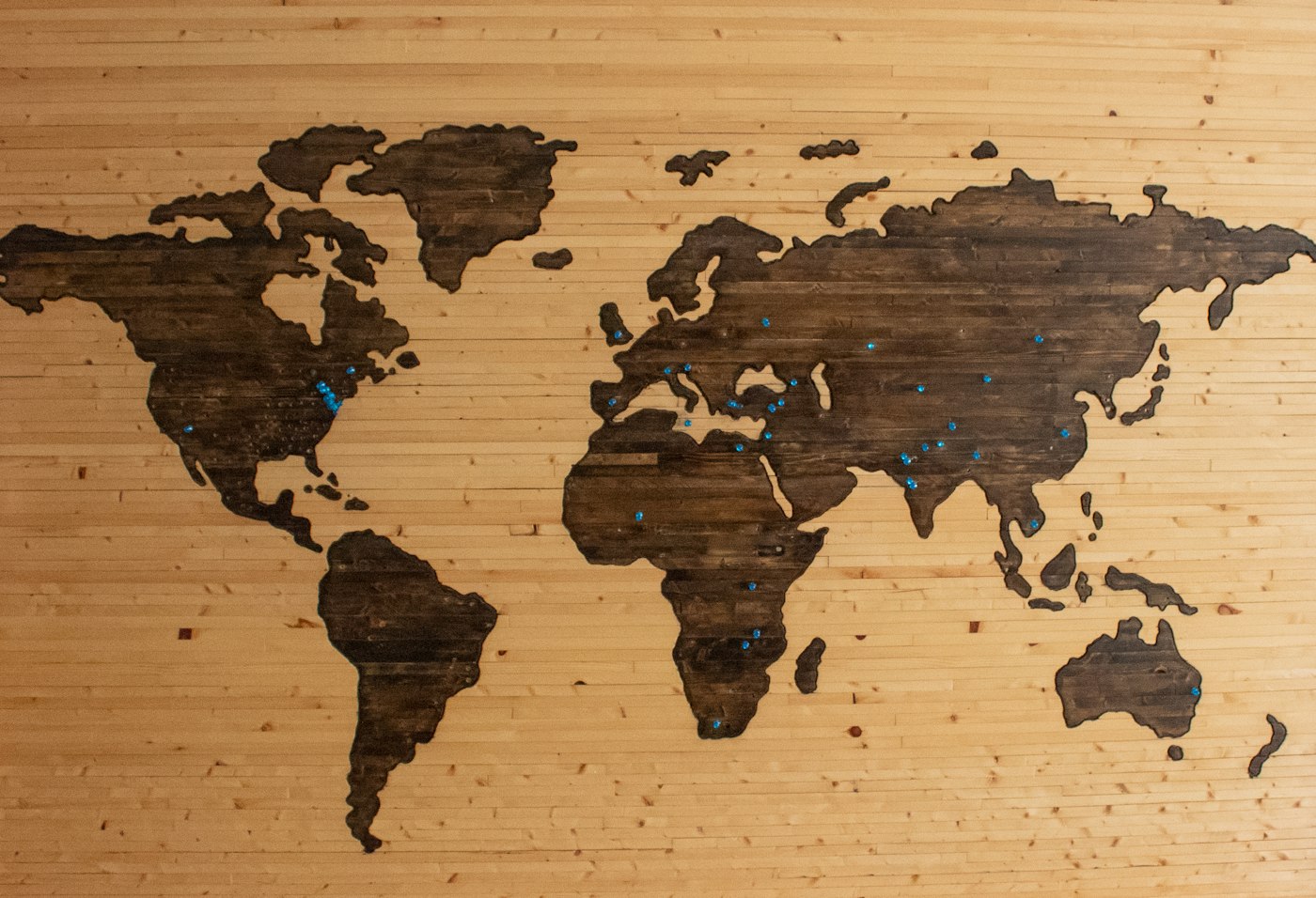 Dark world map with glowing gold connection lines